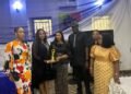 Rotary International present award to Oko Poly Rector