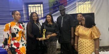 Rotary International present award to Oko Poly Rector