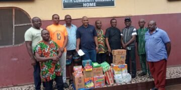 Anglican men visit orphanage