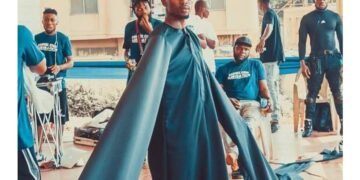 Ezeh – Nigerian Fashion Designer Breaks Guinness World Record With Robe Featuring Longest Sleeves